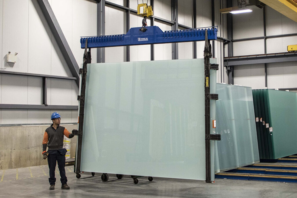 gw employee moving glass at the montreal plant